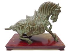 20th Century Chinese Tang Dynasty style bronze model of a Tang Horse, on hardwood base,