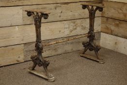 19th century cast iron table moulded with lion masks and paw feet,