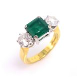 Emerald and diamond three stone gold ring, hallmarked 18ct emerald approx 2 carat, each diamond 0.