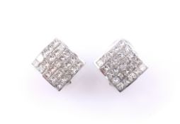Pair of platinum and diamond pave set ear-rings,