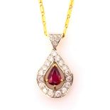 Pear shaped ruby and diamond 18ct white and yellow gold pendant necklace, stamped 750 ruby 8.