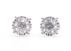 Pair of 18ct white gold diamond ear-rings,