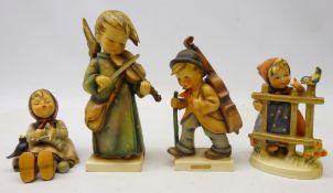 Four Hummel Goebel figures; 'Celestial Musician' H18cm, 'Happy Pastime',
