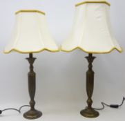 Pair classical style bronzed table lamps, fluted tapered stem on circular base, with shades,