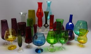 Group of coloured glass drinking glasses, vases,