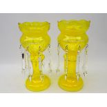Pair 20th century Bohemian yellow tinted glass lustres, with star cut decoration,