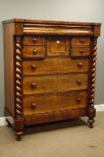 Large Victorian figured mahogany chest, hidden frieze drawer above seven drawers,