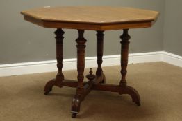 Arts & Crafts period octagonal dining table on four turned pillar supports (D122cm, H73cm),