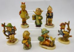 Seven Hummel Goebel figures, 'Singing Lesson', 'Apple Tree Boy', 'Little Gardener',