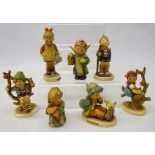 Seven Hummel Goebel figures, 'Singing Lesson', 'Apple Tree Boy', 'Little Gardener',