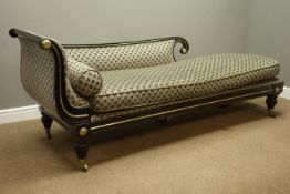 Regency ebonised chaise longue, scrolled and reeded frame, brass beading and circular mounts,