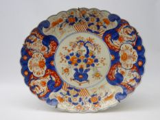 Early 20th century Japanese Imari oval charger with scalloped rim,
