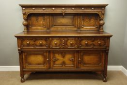 20th century carved oak sideboard, raised back with arched panels,