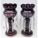 Pair 20th century Bohemian purple tinted glass lustres, with star cut decoration,