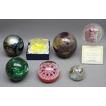 Isle of Wight iridescent glass paperweight, Caithness 'Pink Champagne' paperweight with stand,