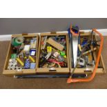 Large quantity of tools; saws, drill bits, various screws, hand drills, tape measures, chisels,