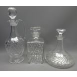 Cut crystal claret jug of footed tapered form and a matching ships decanter and square form