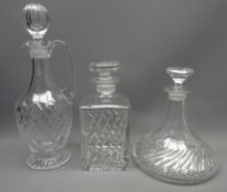Cut crystal claret jug of footed tapered form and a matching ships decanter and square form