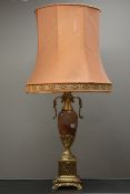 Large gilt metal table lamp, 19th century style, of urn form with simulated polished stone body,
