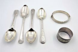 Georgian and Victorian silver spoons; napkin ring and silver hinged bangle,
