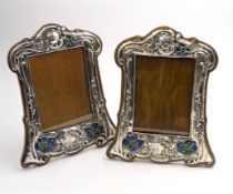 Pair of Art Nouveau silver and enamel on oak freestanding photograph frames by R U & Co Birmingham