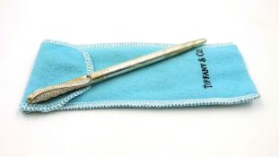 Tiffany silver ball-point pen with feather plume decoration,