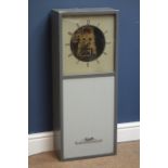 STR electric wall clock, square Arabic dial with visible brass movement in grey painted case,