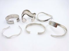 Six silver swirl and contemporary design bangles hallmarked or stamped 925 approx 3.
