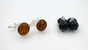 Pair of silver and amber cufflinks pair and a black onyx and agate pair Condition Report