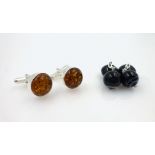 Pair of silver and amber cufflinks pair and a black onyx and agate pair Condition Report