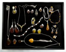 Silver amber set jewellery stamped 925 and other amber type jewellery Condition Report