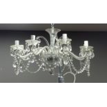 Eight branch clear glass chandelier with cut glass drops,