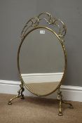 Victorian oval brass framed fire screen, with scroll work top,
