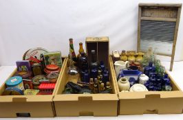 Quantity of vintage tins, stoneware marmalade jar with crest, glass buoys, vintage glass bottles,