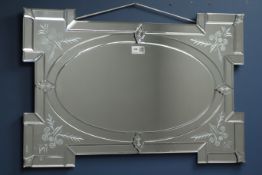 Venetian style wall mirror with bevelled plates, etched scrolled decoration,
