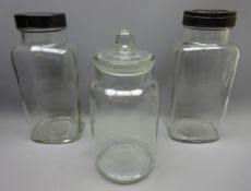 Three clear glass sweet jars,