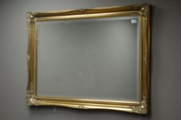Gilt framed wall mirror with bevelled glass,