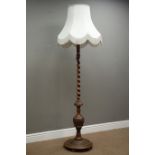 Late 20th century walnut barley twist and carved walnut standard lamp with shade,
