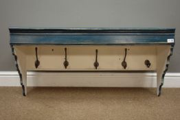 Rustic blue and white painted and waxed wall hanging coat rack, shaped sides and moulded cornice,