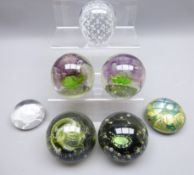Four Caithness glass paperweights, two 'Sea Kelp', 'North Sea' & 'Sea Crab',