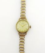 Buren Grand Prix Swiss gold wristwatch, on Bonklip gold bracelet hallmarked 9ct approx 20.