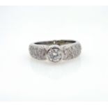 18ct white gold diamond ring, central diamond approx 0.