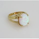 Gold opal split shank ring hallmarked 9ct Condition Report opal 1.2cm. Approx 5.