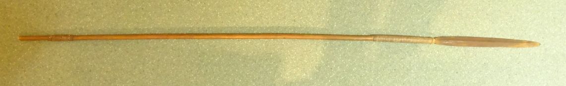 Early 20th century African tribal Assegai with leather bound grip and weighted shaft,