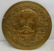 Bronze circular plaque relief decorated with 'Kitchener of Khartoum' surrounded by a laurel wreath