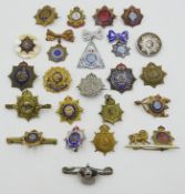 Collection of Army Service Corps sweetheart brooches including; mother of pearl, enamelled,