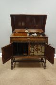 1930s 'Gilbert' gramophone in oak cabinet with records, W85cm, H85cm,