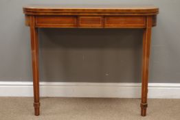 Early 19th century mahogany card table, fold over top with oval and segmented inlay,