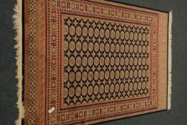 Persian Bokhara design blue ground rug/wall hanging,