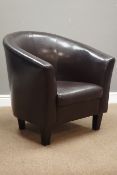 Tub shaped armchair upholstered in faux brown leather,